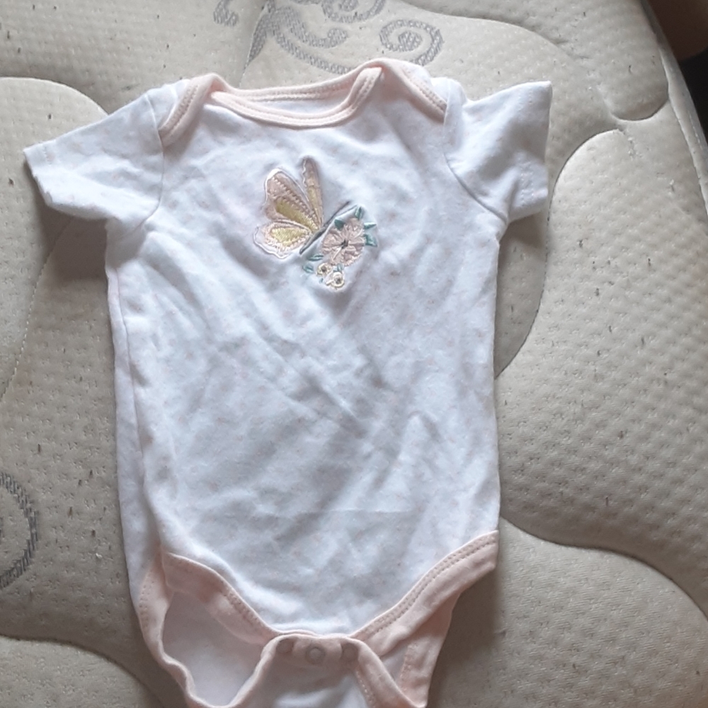 Baby girl onsie. The brand is kyle and deena